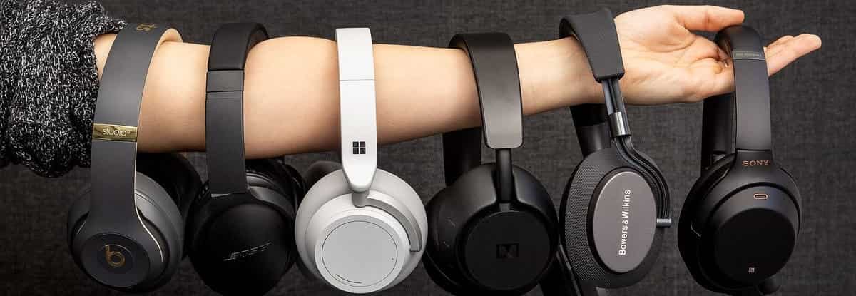 wireless gaming headsets hanging on an arm