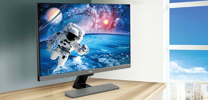 monitor with a space background