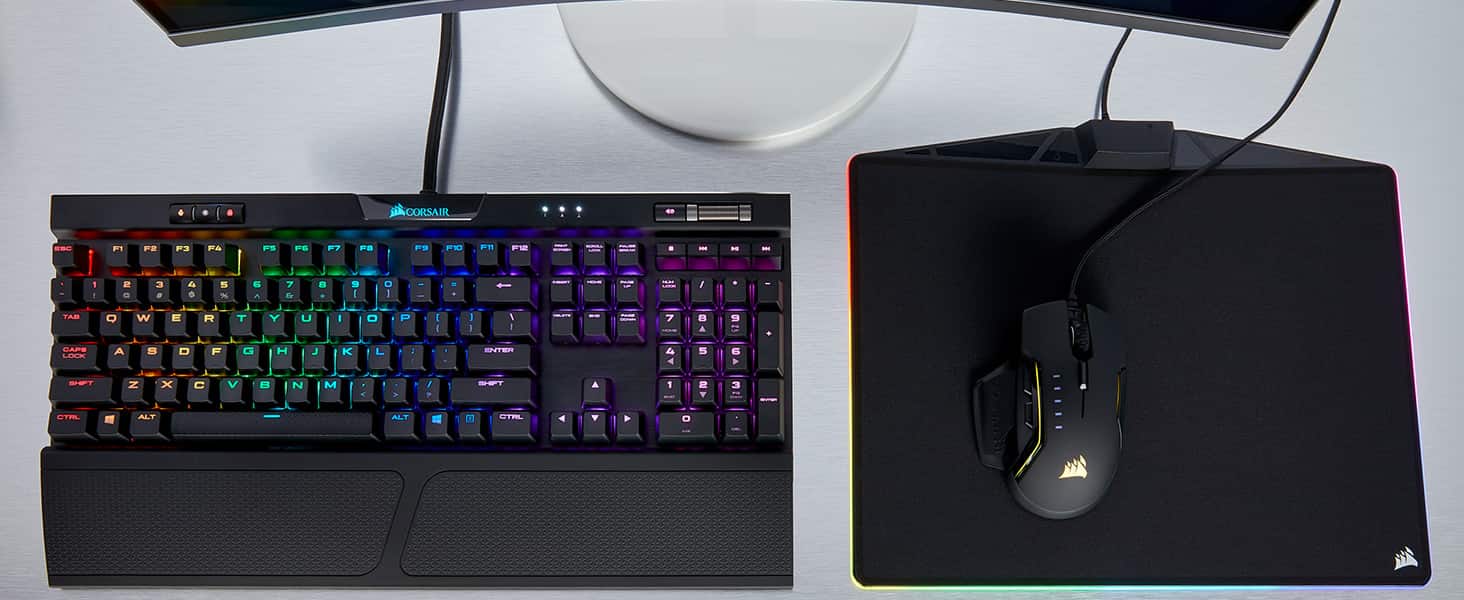 CORSAIR K70 RGB RAPIDFIRE Mechanical Gaming Keyboard Keys next to a corsair mouse