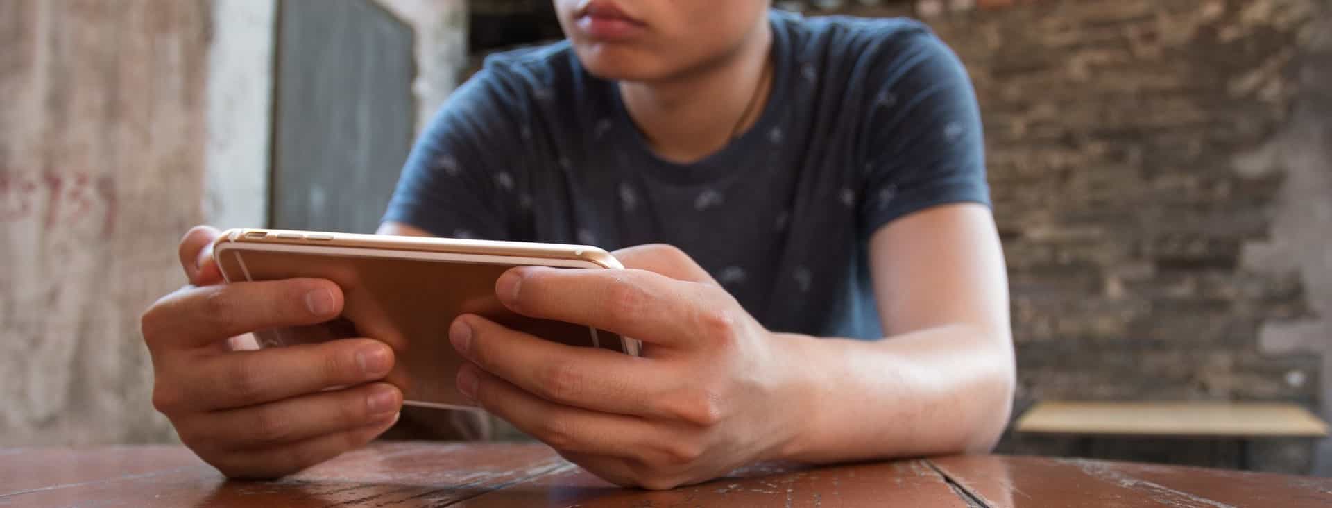 guy holding a mobile phone