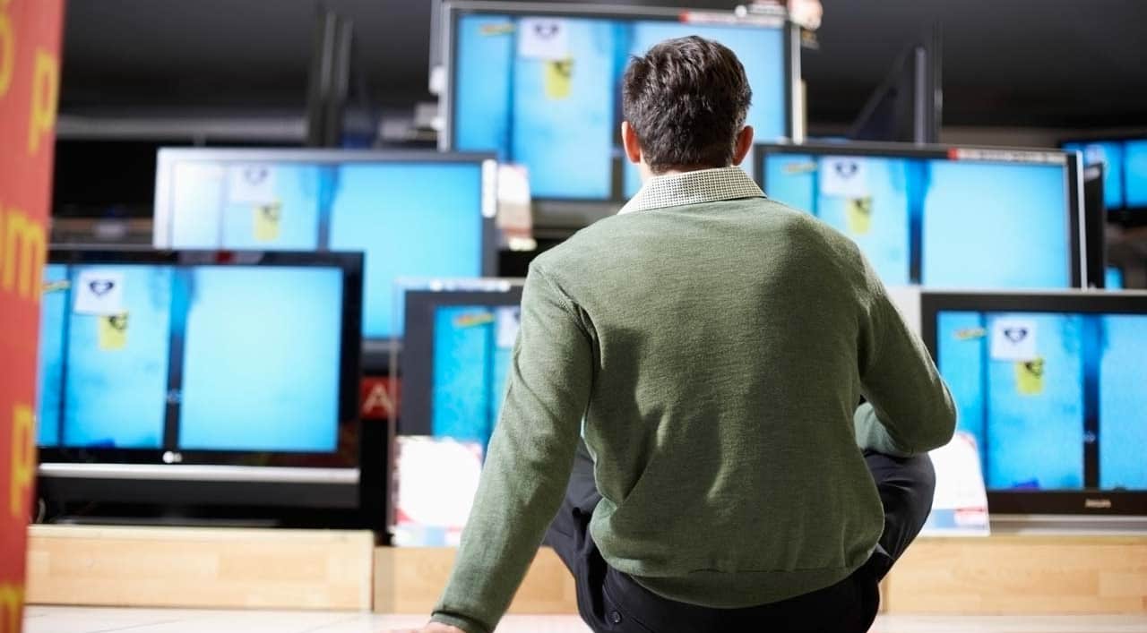 man looking at best buy black friday deals