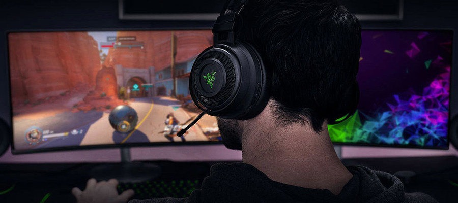 man playing PC game