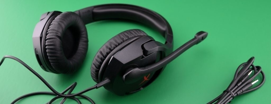 HyperX Cloud Stinger Gaming Headset with Cord on Green background