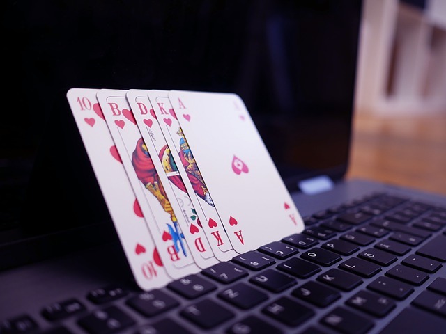 tags: playing cards on a laptop